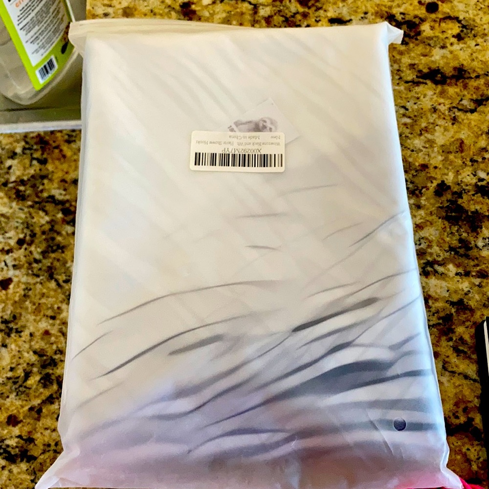 Sloth shower curtain with rings